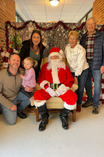 Lori family photo with Santa Clause